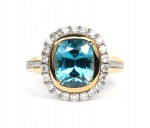 14K TWO TONE DIAMOND & BLUE ZIRCON RING