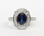 18K WHITE GOLD DIAMOND AND OVAL SAPPHIRE RING