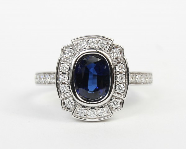 18K WHITE GOLD DIAMOND AND OVAL SAPPHIRE RING