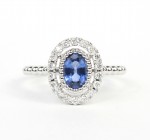14K WHITE GOLD DIAMOND AND OVAL SAPPHIRE RING
