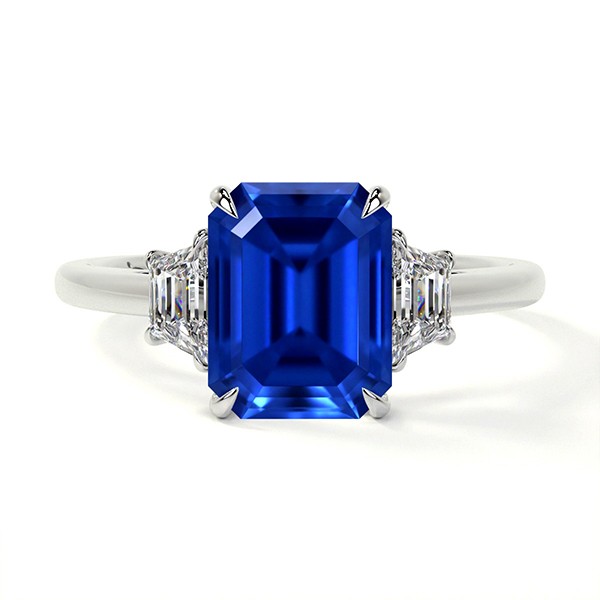 PLATINUM EMERALD CUT BLUE SAPPHIRE RING WITH TRAPEZOID DIAMONDS