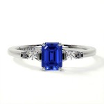 PLATINUM EMERALD CUT SAPPHIRE RING WITH TAPERED BAGUETTE DIAMONDS