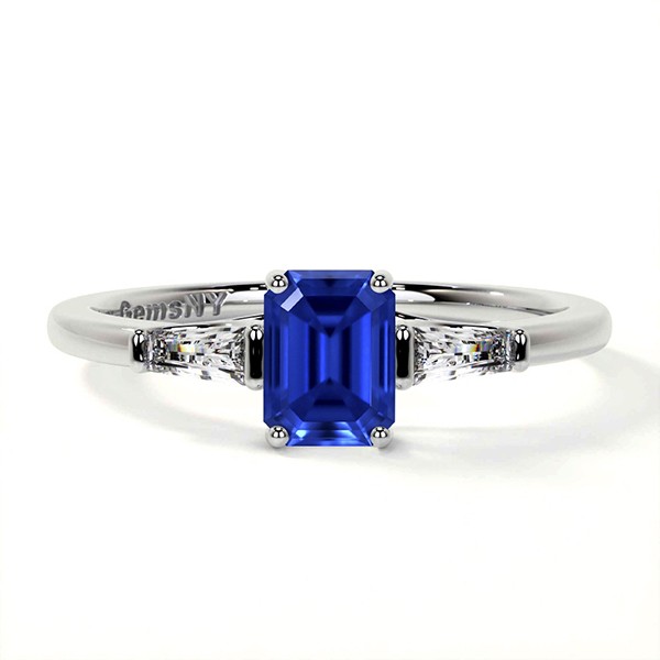 PLATINUM EMERALD CUT SAPPHIRE RING WITH TAPERED BAGUETTE DIAMONDS