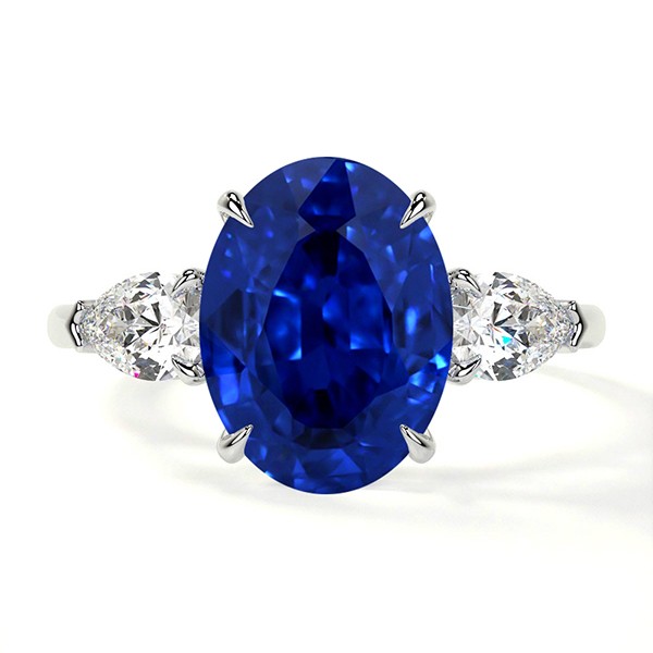 PLATINUM OVAL SAPPHIRE RING WITH PEAR DIAMONDS