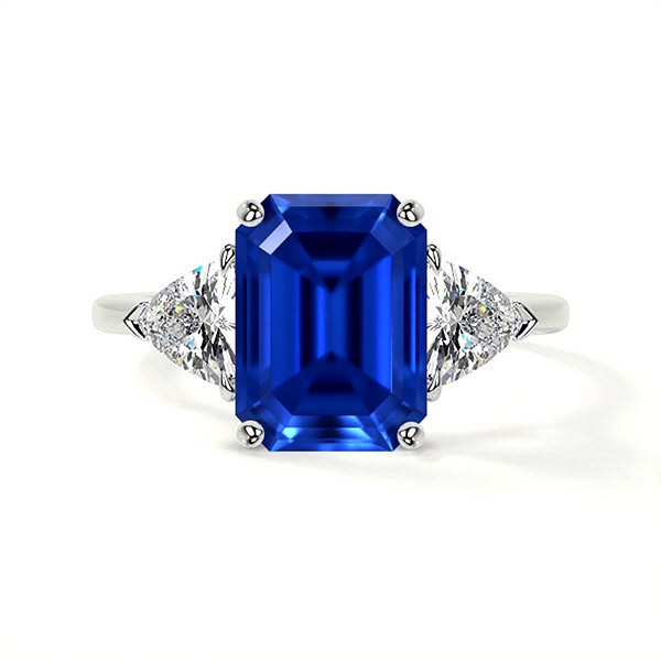 PLATINUM EMERALD CUT SAPPHIRE RING WITH TRILLION & ROUND DIAMONDS