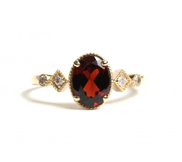 14K YELLOW GOLD DIAMOND AND OVAL GARNET RING