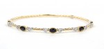 14K TWO TONE DIAMOND AND SAPPHIRE BANGLE BRACELET