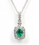14K WHITE GOLD EMERALD AND DIAMOND HALO PENDANT