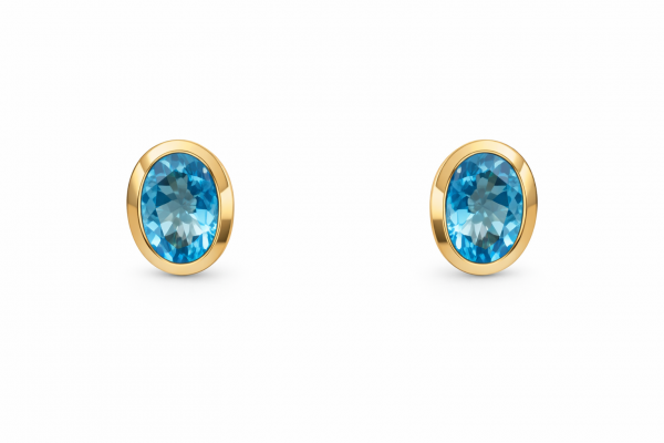 14K YELLOW GOLD BEZEL SET SWISS BLUE OVAL EARRINGS