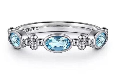 STERLING SILVER BLUE TOPAZ BUJUKAN RING