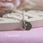 STAINLESS STEEL CHILD NECKLACE WITH DISC AND TINY CROSS