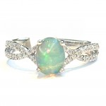 10K WHITE GOLD OVAL OPAL AND DIAMOND TWIST RING