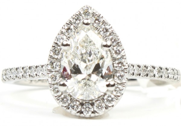 PLATINUM ENGAGEMENT RING WITH .91CT CENTER PEAR DIAMOND SURROUNDED BY A DIAMOND HALO