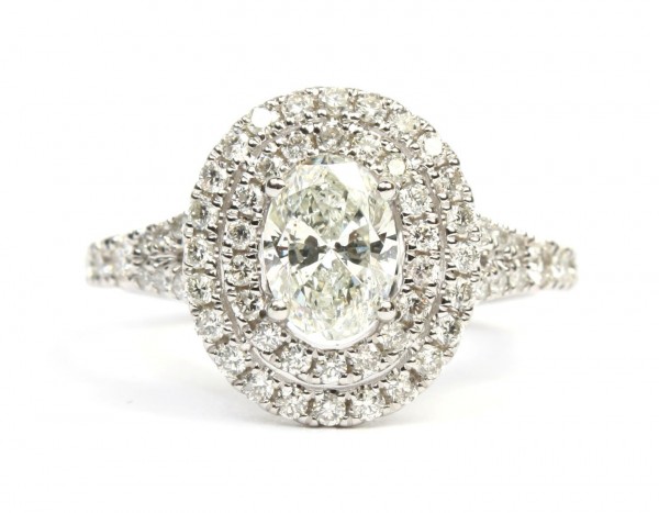 PLATINUM OVAL DIAMOND RING WITH A DOUBLE HALO