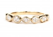14K YELLOW GOLD BAND WITH OVAL, PEAR & MARQUISE BEZEL SET DIAMONDS
