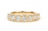 14K YELLOW GOLD ROUND DIAMOND BAND WITH CUSHION MILGRAIN FRAMES