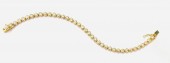 14K YELLOW GOLD BEZEL SET DIAMOND TENNIS BRACELET