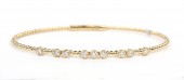 14K YELLOW GOLD DIAMOND STATION FLEXIBLE BANGLE