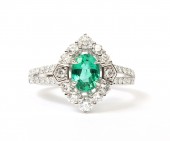 18K WHITE GOLD .69CTW DIAMOND .64CT OVAL EMERALD RING