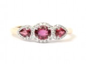14K TWO TONE 1/7CTW DIAMOND 3/4CT RUBY RING
