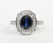 18K WHITE GOLD DIAMOND AND OVAL SAPPHIRE RING