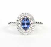 14K WHITE GOLD DIAMOND AND OVAL SAPPHIRE RING