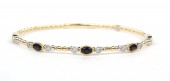 14K TWO TONE DIAMOND AND SAPPHIRE BANGLE BRACELET