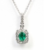14K WHITE GOLD EMERALD AND DIAMOND HALO PENDANT
