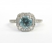14K WHITE GOLD ROUND AQUAMARINE AND DIAMOND HALO RING