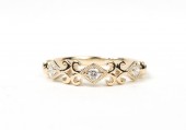 14K YELLOW GOLD DIAMOND BAND WITH CURLS .13CTW