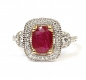 PLATINUM AND 14K YELLOW GOLD DIAMOND AND RUBY RING