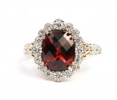 STERLING SILVER AND 14K DIAMOND AND GARNET RING