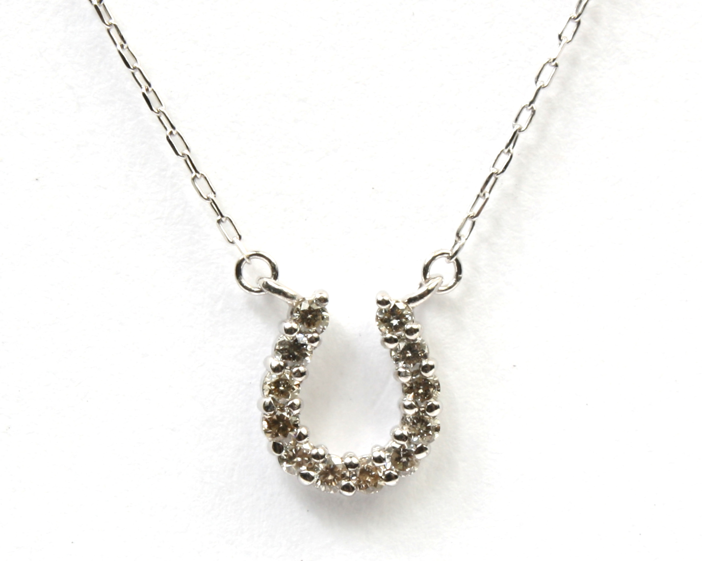 10kt White Gold Womens Round Diamond Cross Horseshoe Necklace 1/6 Cttw |  Las Villas Jewelry